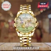 Winnie the Pooh 100th Anniversary Gold Tone Quartz Watch featuring Pooh, Piglet, and Tigger on a beige clock face.