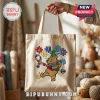 Natural canvas tote bag featuring an embroidered Winnie the Pooh holding an autism awareness ribbon and puzzle pieces.!