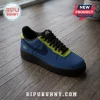 Custom Nike Air Force 1 sneaker in blue, lime green, and black with a small winged logo and custom name inscription.!