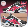Atlanta Dream WNBA themed athletic sneakers with black, white, red, and blue patterns on a brown cardboard shoebox.!