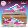 Custom Nike Air Force 1 sneakers in pink, white, and teal featuring a personalized name script and shield logo.!