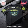 Black athletic jersey with lime green stripes, Dallas Wings logo featuring a horse, and white v-neck on wood surface.!