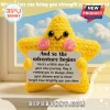 Yellow crochet star plush toy with black safety eyes and pink cheeks holding a card saying And so the adventure begins.!