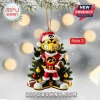 2026 Iowa Hawkeyes Mascot Christmas ornament featuring the hawk wearing a Santa suit and holding a football on a tree.