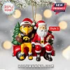 2026 Iowa Hawkeyes Mascot Christmas ornament featuring Herky and Santa Claus sitting in a red truck with a green pine tree.