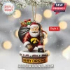 2026 Iowa Hawkeyes Mascot Christmas Ornament featuring Santa in a team jersey standing on a brick chimney base.