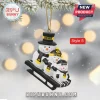2026 Iowa Hawkeyes Mascot Christmas Ornament featuring three snowmen on a black sled with gold and black team branding.