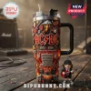 AC/DC 53 Years High Voltage Rock 40oz Stanley Tumbler with band graphics, lightning bolts, and a hanging guitar player charm.