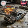 AC/DC Angus Young Hot Wheels diecast car featuring a matte black finish with lightning graphics and guitar player art.