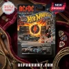 AC/DC Angus Young Hot Wheels diecast car in original packaging with lightning graphics and guitar amplifier background.