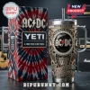 AC/DC Embossed 40oz Stanley Tumbler featuring metallic band iconography, high voltage text, and a matching tie-dye box.