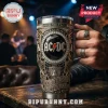 AC/DC Embossed 40oz Stanley Tumbler featuring rock band motifs, metallic textures, and a central faceted stone emblem.