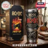 AC/DC High Voltage Stainless Steel Handle Tumbler featuring band logo, cannons, and black leather-textured finish on desk.
