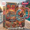ACDC Summer Heatseeker Stanley Tumbler 40oz with rock band graphics, surfing imagery, and glitter handle on a boat deck.