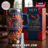 Adelaide Football Club 36th Anniversary Tie-Dye Stanley Tumbler with team logo, stadium graphic, and handle on wooden table.