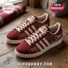Adidas Oklahoma Sooners Suede Casual Sneakers in maroon with white stripes, white laces, and University of Oklahoma logos.