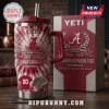 Alabama Crimson Tide 134th Anniversary YETI tumbler with crimson tie-dye pattern, handle, straw, and stadium graphic.