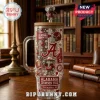 Alabama Crimson Tide 40oz clear tumbler with handle, wooden lid, and elephant straw topper in a library setting.