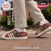 Alabama Crimson Tide Adidas mascot casual sneakers featuring red canvas, white stripes, elephant graphic, and team logos.
