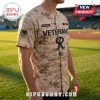 All Team MLB Veterans Day 250 Years Freedom Camo Baseball Jersey with US flag and desert camouflage pattern on a field.