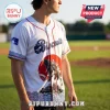 All Team MLB x King of the Monsters Collab Baseball Jersey featuring a Godzilla graphic over a red sun and blue waves.