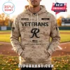 All Team NCAA Veterans Day 250 Years Camo Mascot Hoodie featuring tan digital camo pattern, VETERANS text, and US flag icon.