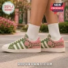 Alpha Kappa Alpha Floral Casual Sneakers featuring green and pink panels, rose embroidery, and white rubber soles.
