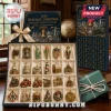 America 250th Anniversary Heritage Advent Calendar with 24 gold and painted ornaments inside a blue decorative display box.