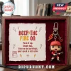 Angus Young Funko Pop Keychain in a velvet-lined wooden case with lightning bolt accents and an inspirational quote.