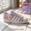 Ariana Grande x Adidas 7 Rings Lavender casual shoes featuring pastel pink, purple tones, moon motifs, and gem embellishments.