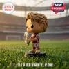 Arsenal FC 2026 FA Community Shield Champions vinyl figure wearing a red and white jersey on a grass stadium background.