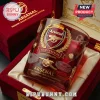 Arsenal FC Premier League Champions embossed whiskey glass featuring gold crest and soccer stadium details in a red box.