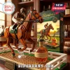 Blanton’s Kentucky Racing Heritage Building Set with brown brick horse, jockey, and racetrack base on wooden surface.