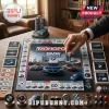 BMW Monopoly Collector Edition Board Game with branded game pieces, car miniatures, and dice on a wooden tabletop.