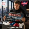 BMW Monopoly Collector Edition Board Game box featuring luxury cars in front of a city skyline held by a man in a hoodie.