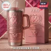 Breast Cancer Awareness 2026 YETI Stanley Tumbler in metallic pink with engraved ribbon, laurel wreath, and butterfly icons.