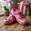 Breast Cancer Awareness Be Strong Pink Crocs With Charms featuring ribbon motifs, faith text, and rubber construction.