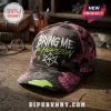 Bring Me The Horizon Neon Camo Logo Cap featuring pink and grey camouflage print with white band logo on wooden background.