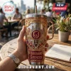 Brisbane Broncos 38th Anniversary Gold 40oz Stanley Tumbler featuring team logo, city skyline, and players in metallic finish.