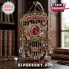 Brisbane Broncos Crystal Suncatcher Wind Chime with team logo, hanging crystals, and gold filigree on a wooden desk stand.