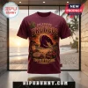 Brisbane Broncos Maroon Summer Mascot Shirt featuring a sunset beach graphic, team horse logo, and rugby ball on the front.