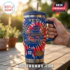 Buffalo Bills 1960-2026 Anniversary Edition Stanley Tumbler featuring a red, white, and blue tie-dye pattern and team logo.
