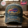 Buffalo Bills Distressed Denim Baseball Cap with Old Fuckers Club and 100% Bitter text embroidery on a wooden table.