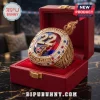 Caitlin Clark Indiana Fever 22 gold championship ring with red and blue accents inside a red velvet display case.