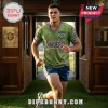 Canberra Raiders Distressed Green T-Shirt featuring vintage team branding and 1982 graphics on a male athlete.