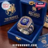 Canterbury-Bankstown Bulldogs 91st Anniversary Ring with a blue gemstone, bulldog logo, and metallic finish in a display box.