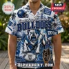 Canterbury-Bankstown Bulldogs Mascot Hawaiian shirt featuring blue and white NRL team graphics, helmets, and rugby balls.