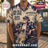 Carlton Blues AFL Mascot Hawaiian shirt in beige with navy blue palm trees, vintage car, and team branding graphics.
