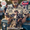 Carlton Blues AFL Mascot Hawaiian shirt in beige and blue with team logos, palm tree patterns, and text graphics.