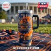 Chicago Bears 107th Anniversary Tie-Dye Stanley Tumbler with a orange and blue swirl pattern and team anniversary logo.